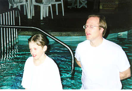 Buzz_baptize.jpg (23135 bytes)
