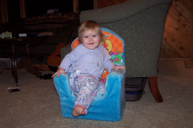 Jazmyn in chair from grandpa Ross